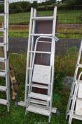 A three rung step ladder and an aluminium platform.