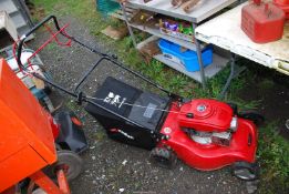 An Einhell propelled lawn mower with grass box - as new