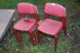 Six children's stackable chairs.