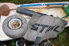 A wheel/tyre 15x6.00/6 plus a blow pipe and a bag for a Stihl leaf blower.