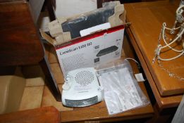 A Canoscan lide 110 scanner and a heater.