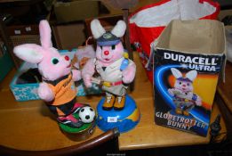 Two globe trotter Duracell Bunnies.