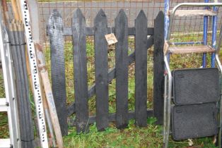 A wooden gate 3ft x 37".