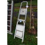 Two step ladders; one steel two rung, one aluminium five rung.