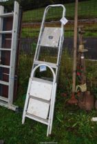Two step ladders; one steel two rung, one aluminium five rung.