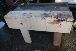 A woodwork bench - 54" wide x 28" depth x 33" high.