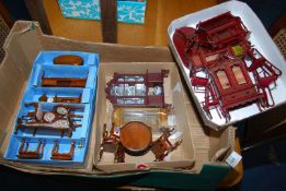 A quantity of dolls house furniture.