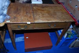 A table with two drawers 38 1/2" x 20" x 31" high.