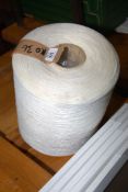 A large roll of thread.