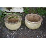 Two concrete planters 15" diameter x 10" deep.