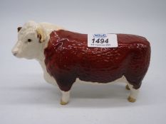 A Beswick 'Champion of Champions' horned Hereford bull figure.