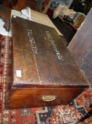 A dark Mahogany travelling Chest/Trunk with brass backplate carrying handles,