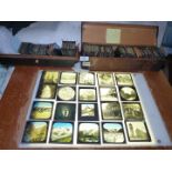 Two boxes of glass slides to include Maypole W.B. 1910 and St. Marks W.B., Niagra Falls, etc.