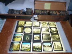 Two boxes of glass slides to include Maypole W.B. 1910 and St. Marks W.B., Niagra Falls, etc.