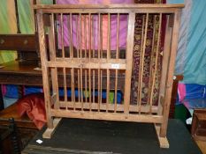 A pine two tier plate rack ( 21 sections), some woodworm damage, 30" wide x 31" high x 10 3/4" deep.