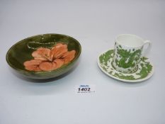 A Moorcroft small green footed 'hibiscus' bowl,