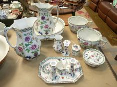 A Corona Ware bedroom set of two wash jugs and chamber pots, one wash bowl, etc,