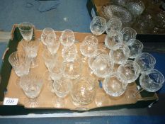 A quantity of cut glass including wine, brandy and hock glasses.