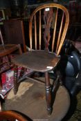 A solid Elm seated Side Chair having a fret-worked back-splat and bentwood framed backrest and