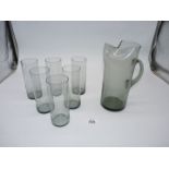 A White Friars smoky grey glass Lemonade jug and 6 glasses.