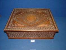 A large 18th Century Oak bible or document Box having intricate carving of flower heads on all four