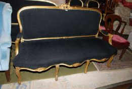 A gilded framed French style six legged three seater Sofa unusually upholstered in black fabric. N.