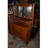 A Satinwood dressing Chest having two long and two short Drawers,