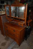 A Satinwood dressing Chest having two long and two short Drawers,