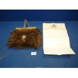 A vintage Kiwi feather and flax bag, 8" x 8",