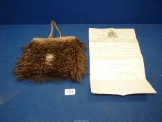 A vintage Kiwi feather and flax bag, 8" x 8",
