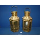 A pair of brass electric lanterns with bevel edge glass panes, 16 1/2'' high.