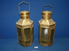 A pair of brass electric lanterns with bevel edge glass panes, 16 1/2'' high.