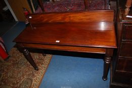 A 19th century Walnut & Mahogany Buffet/serving Table standing on octagonal turned legs and having