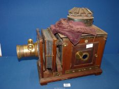 A Magic Lantern with suppliers label 'J.T. Chapman, Photographic Chemist, Manchester'.