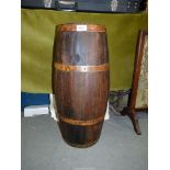 An Oak copper coopered Stick Stand of barrel form, approx. 25" tall.