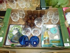 A tray of twenty crystal and coloured glasses including nine purple wine glasses,