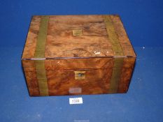 A Walnut correspondence box with brass banding and escutcheon,