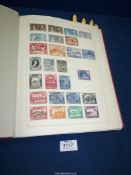 A Senator album of British Commonwealth stamps from Queen Victoria to Queen Elizabeth II.