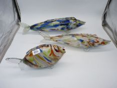 Three large glass multi coloured fish.