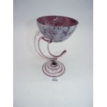 A goblet style ornament in mauve and grey.