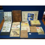 A quantity of cigarette cards including an album of butterflies, birds flowers etc,