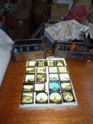 Two boxes of glass slides to include Niagra Falls and The Statue of Liberty,