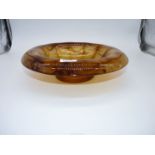 An Art Deco dark amber streaked glass bowl.