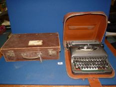 A portable Imperial 'Good Companions' Typewriter and leather suitcase,