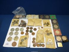 A box of foreign and British coins including Queen Victoria pennies, six-pences, half-pennies,