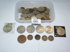 A tub of old British coins including Churchill and Queen Mother crowns, sixpences, threepences,