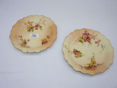 A pair of Royal Worcester blush ivory plates,