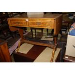 A contemporary cross-banded Walnut and other woods Sofa Table,