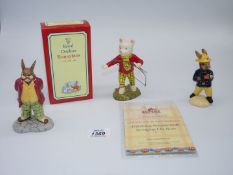Three Royal Doulton figures; a boxed 'Fireman Bunnykins',