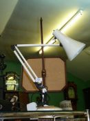 A white angle poise Lamp, type Apex 90.